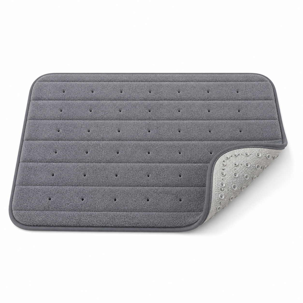 Anti-slip bath mat — charcoal grey surface with drainage holes; corner turned up to show suction cups for grip on wet floors